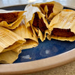 TAMALES - Green Chile Cheese $15 and Red Chile with Veggie $18
